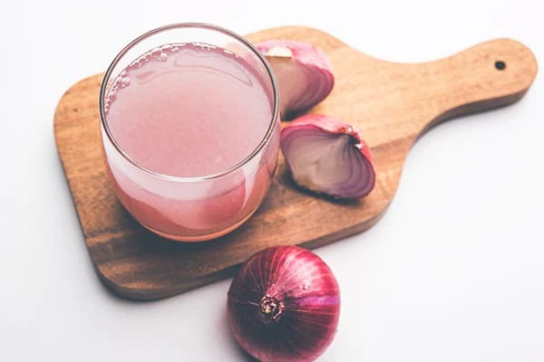 Onion Juice - Home Remedies for Hair Fall